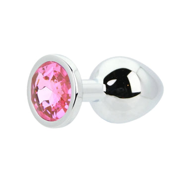 Luxury Toosh Metal Butt Plug with Pink Stone, artistically displayed against a soft background, emphasising its sophistication.